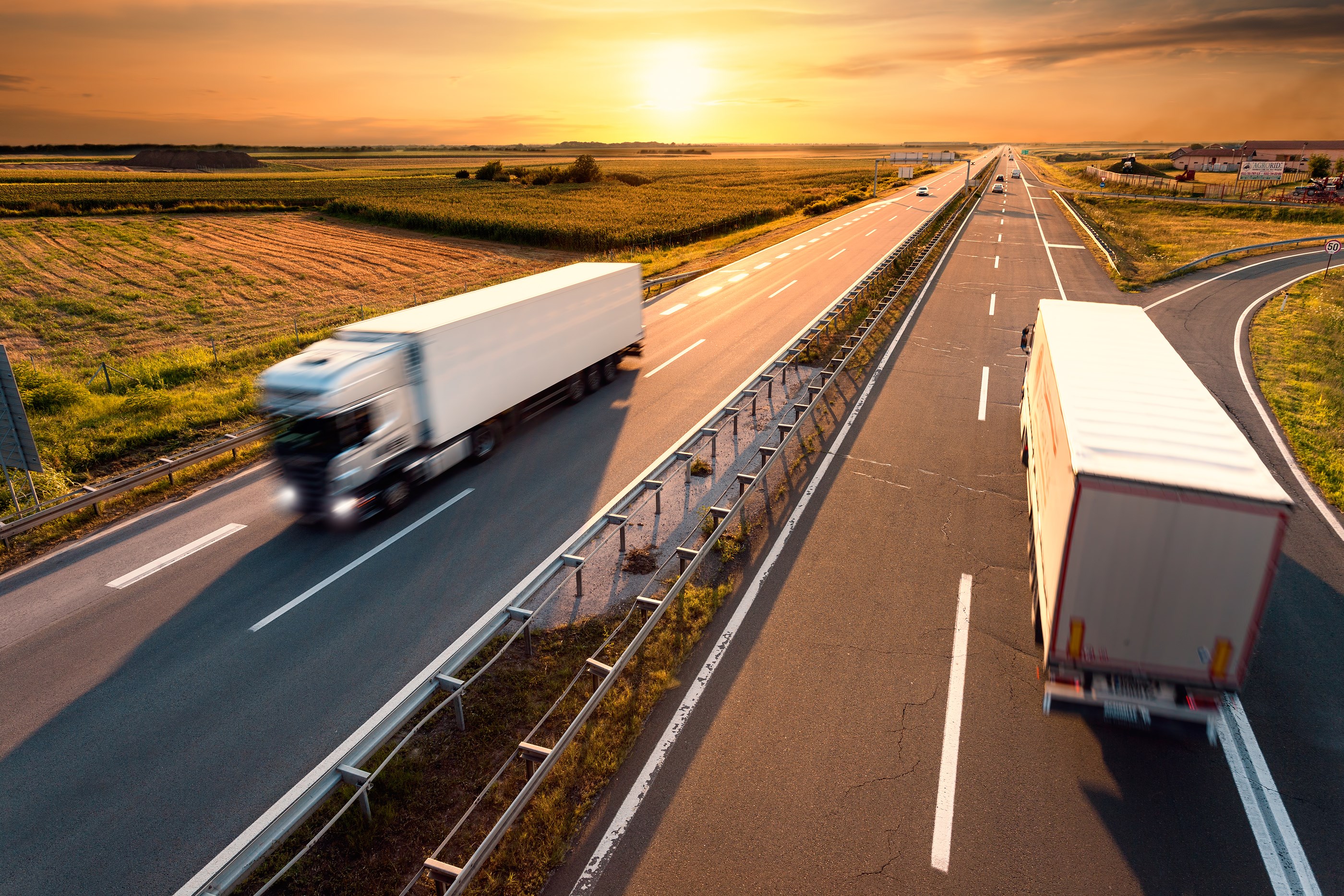 bigstock-Two-Trucks-On-Highway-In-Motio-70870492 bigstock-Two-Trucks-On-Highway-In-Motio-70870492